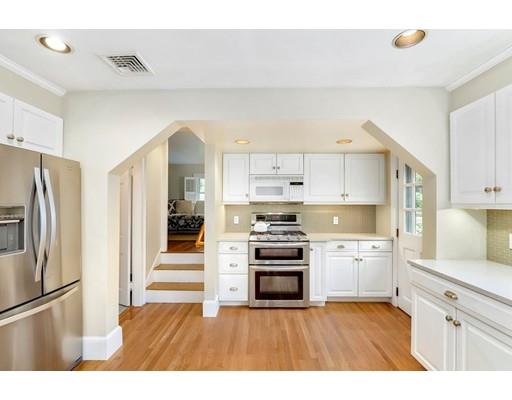 12 Cleveland Road Wellesley, MA 02481 - Photo 12 of 25 a kitchen with stainless steel appliances a stove a refrigerator and a sink