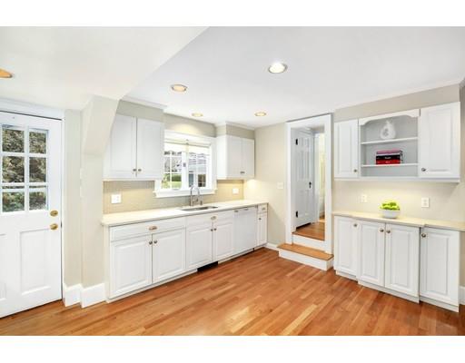 12 Cleveland Road Wellesley, MA 02481 - Photo 13 of 25 a kitchen with granite countertop a sink cabinets stainless steel appliances and a window