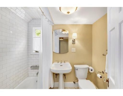 12 Cleveland Road Wellesley, MA 02481 - Photo 17 of 25 a bathroom with a sink and a mirror