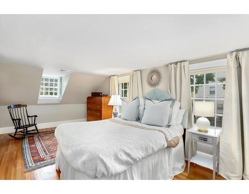 12 Cleveland Road Wellesley, MA 02481 - Photo 20 of 25 a bedroom with a bed and wooden floor