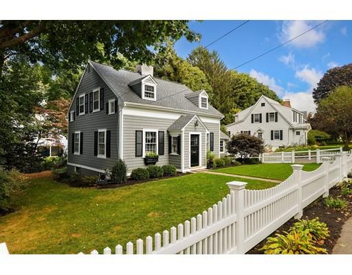 12 Cleveland Road Wellesley, MA 02481 - Photo 2 of 25 a front view of a house with a yard