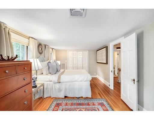 12 Cleveland Road Wellesley, MA 02481 - Photo 21 of 25 a living room with furniture and a wooden floor