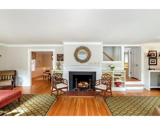 12 Cleveland Road Wellesley, MA 02481 - Photo 4 of 25 a living room with furniture and a fireplace