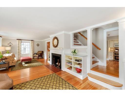 12 Cleveland Road Wellesley, MA 02481 - Photo 8 of 25 a living room with furniture and a fireplace with wooden floor