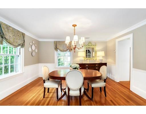 12 Cleveland Road Wellesley, MA 02481 - Photo 10 of 25 a view of a dining room with furniture a chandelier and wooden floor