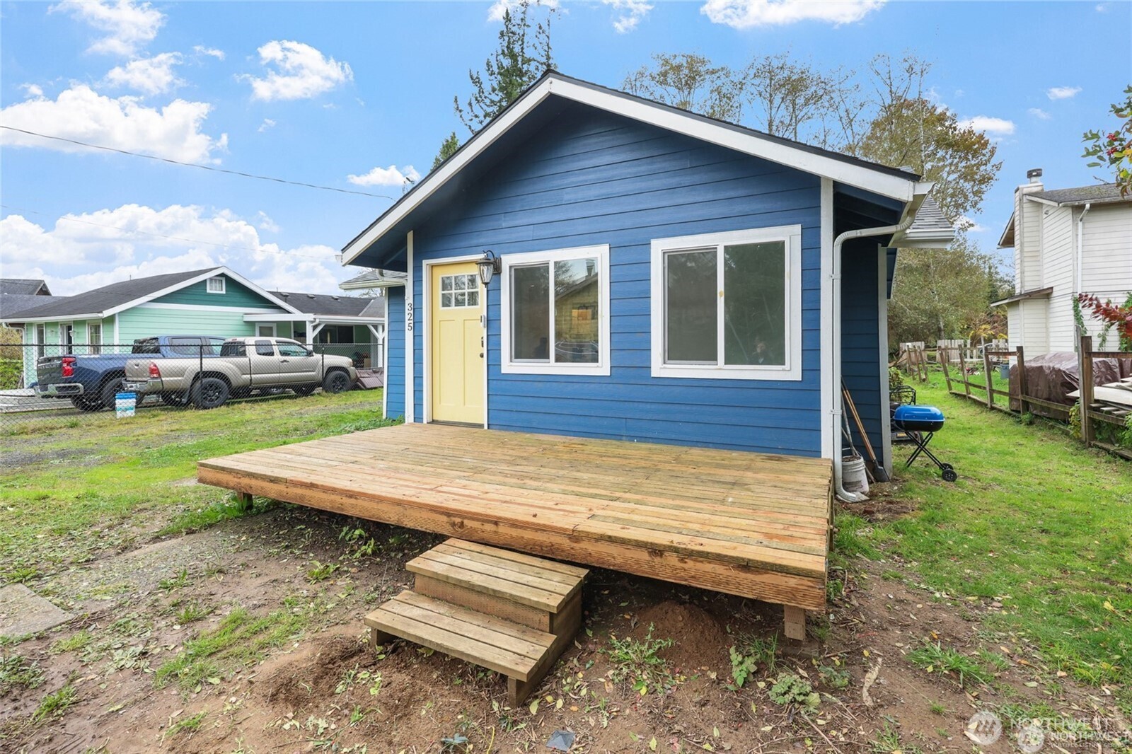 325 East Perry Street Aberdeen, WA 98520 - Photo 3 of 27 a view of a house with a yard