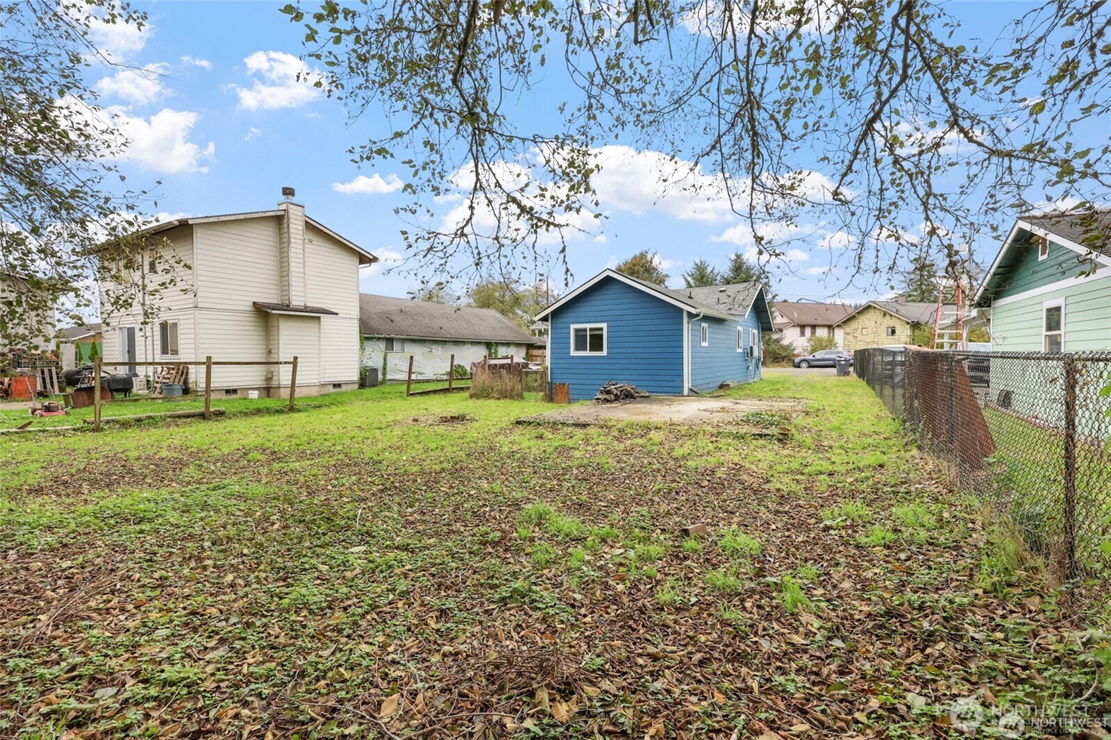 325 East Perry Street Aberdeen, WA 98520 - Photo 4 of 27 a view of a house with a yard
