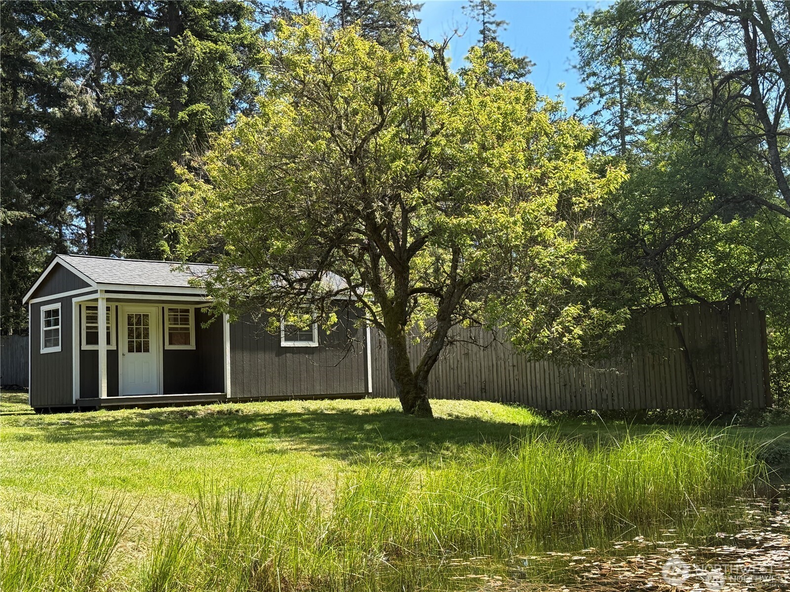 168 Jackson Road Orcas Island, WA 98245 - Photo 14 of 40 a front view of house with yard and green space
