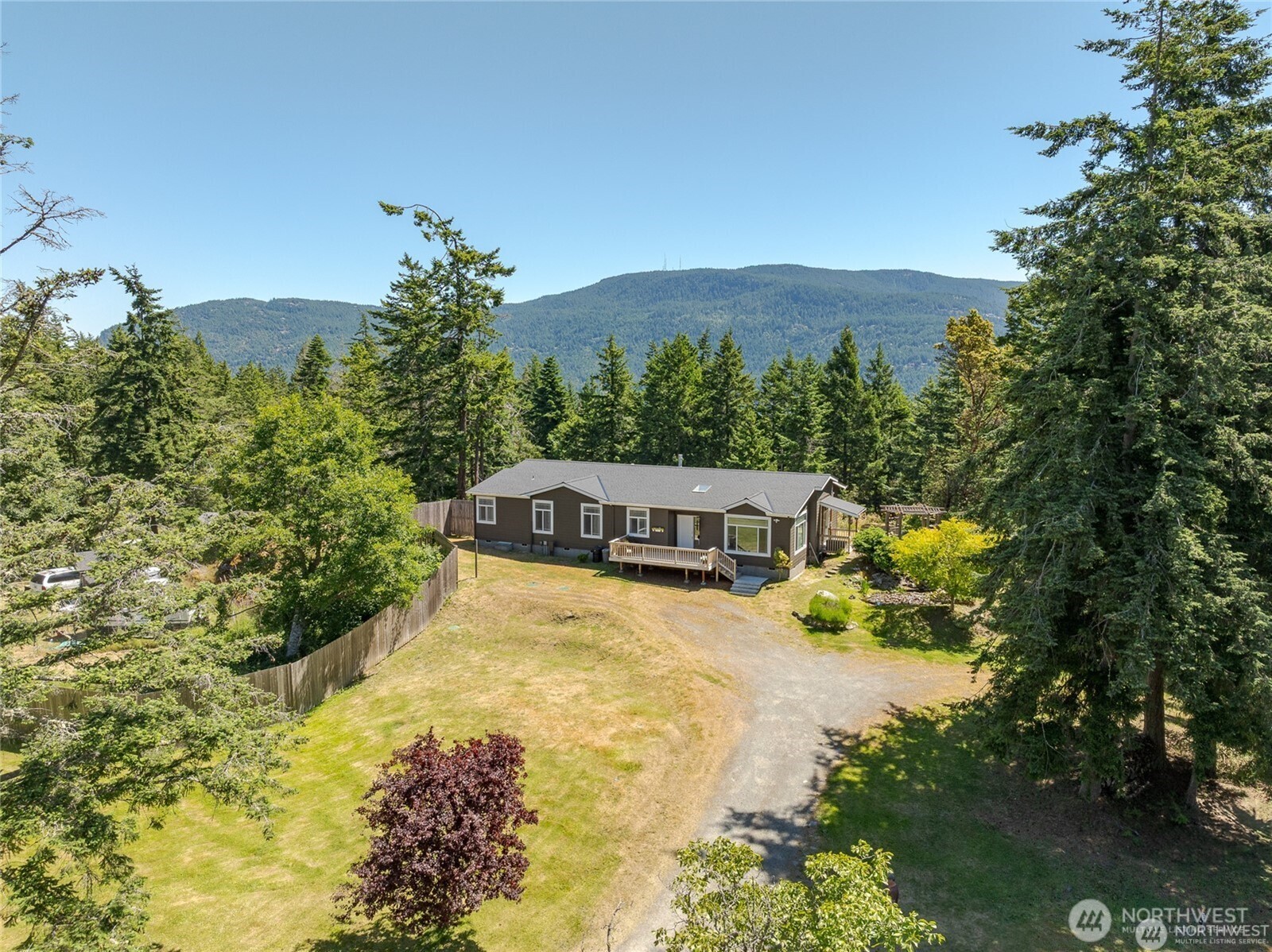 168 Jackson Road Orcas Island, WA 98245 - Photo 2 of 40 a swimming pool with mountain view