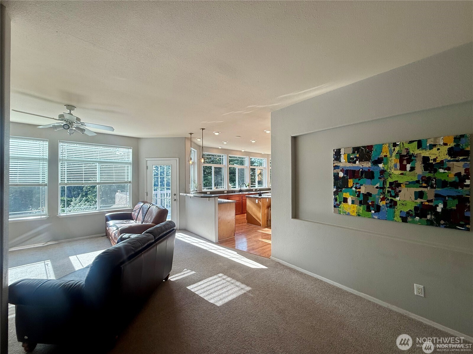 168 Jackson Road Orcas Island, WA 98245 - Photo 26 of 40 a living room with furniture and a floor to ceiling window