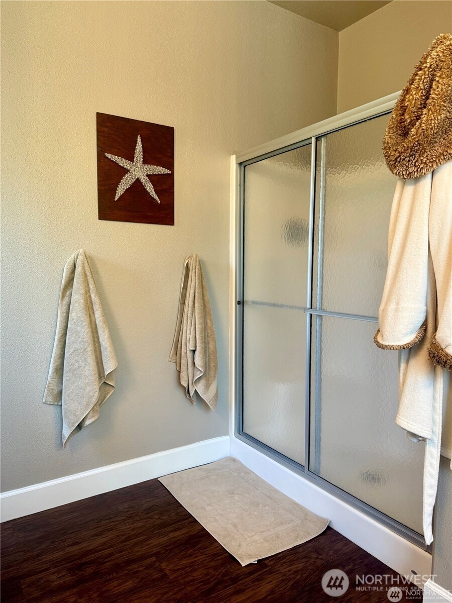 168 Jackson Road Orcas Island, WA 98245 - Photo 31 of 40 a view of walk in closet with clothes and shoes