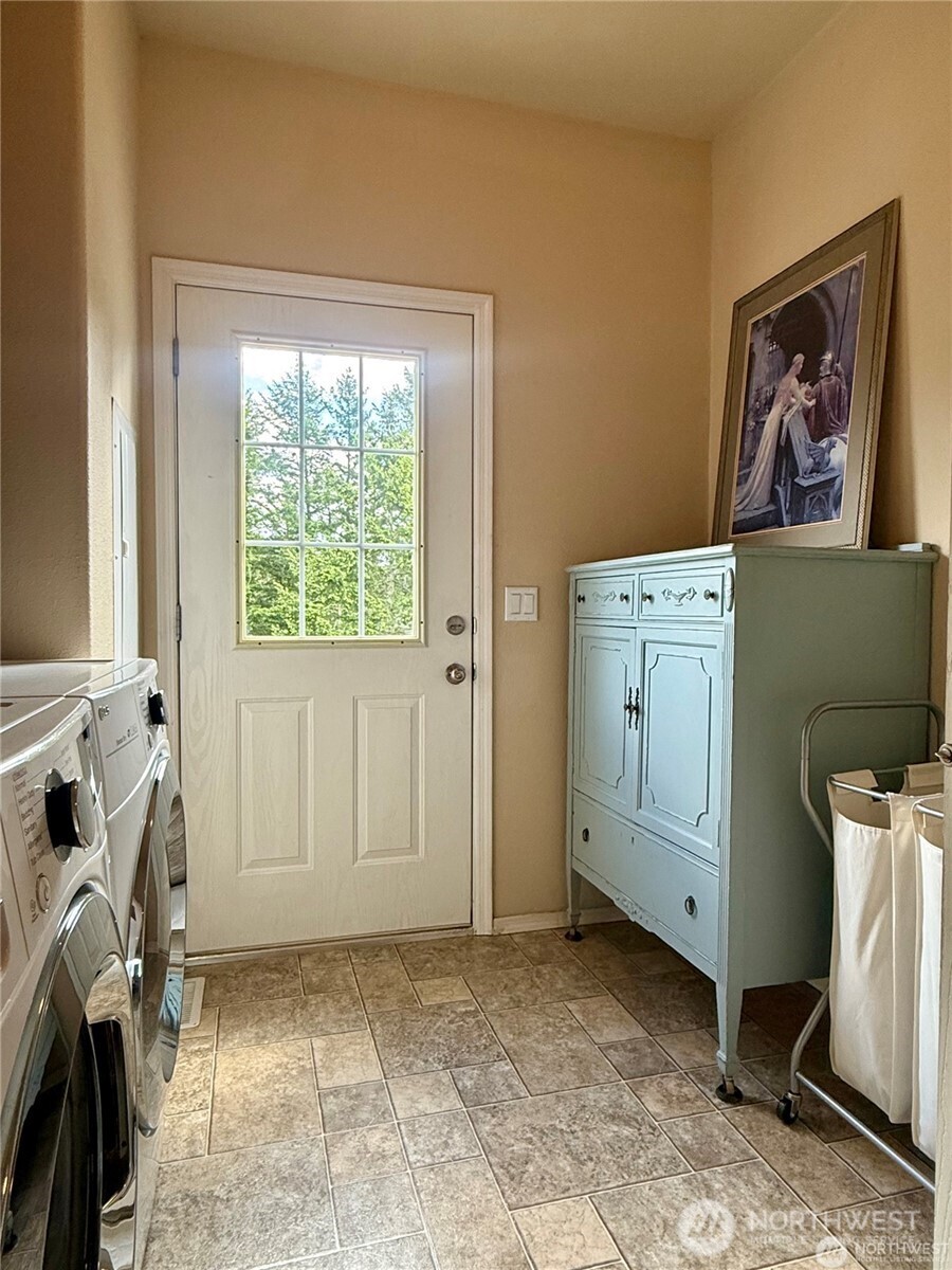 168 Jackson Road Orcas Island, WA 98245 - Photo 38 of 40 a view of a storage & utility room dryer and washer