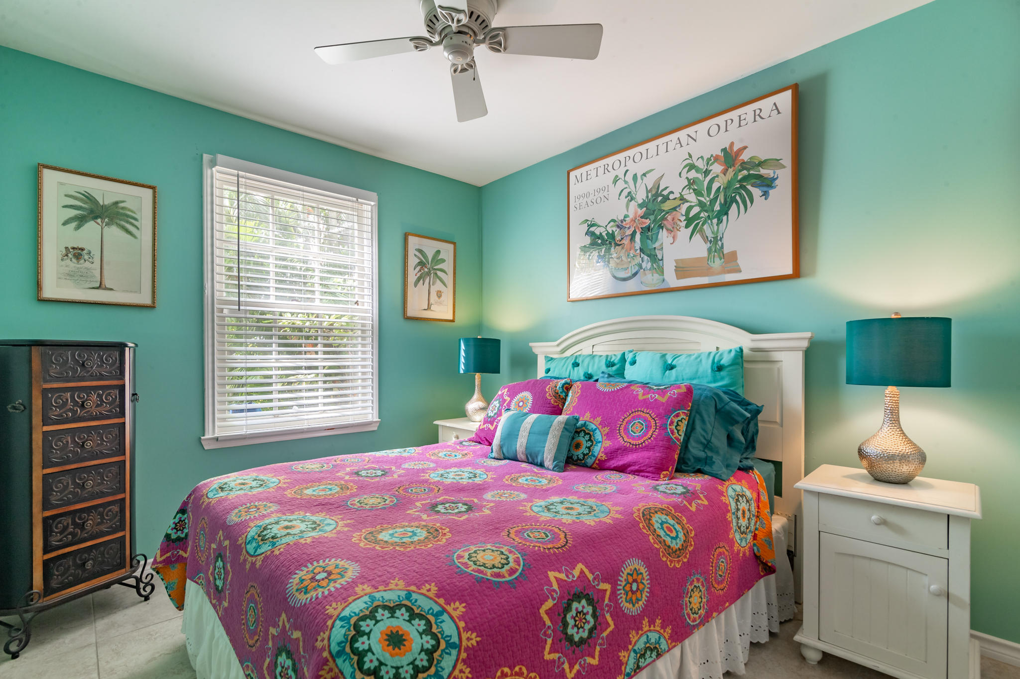 102 Southard Street, Unit 2 Key West, FL 33040 - Photo 11 of 25 a bedroom with a bed a lamp and a window