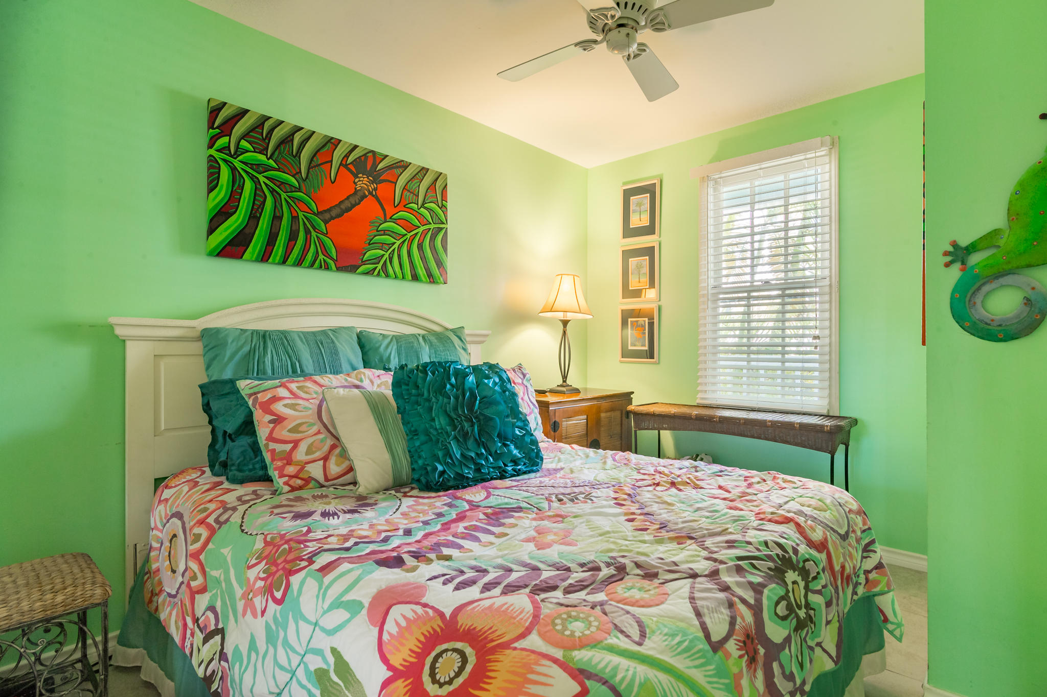 102 Southard Street, Unit 2 Key West, FL 33040 - Photo 12 of 25 a bedroom with a bed and a painting on the wall