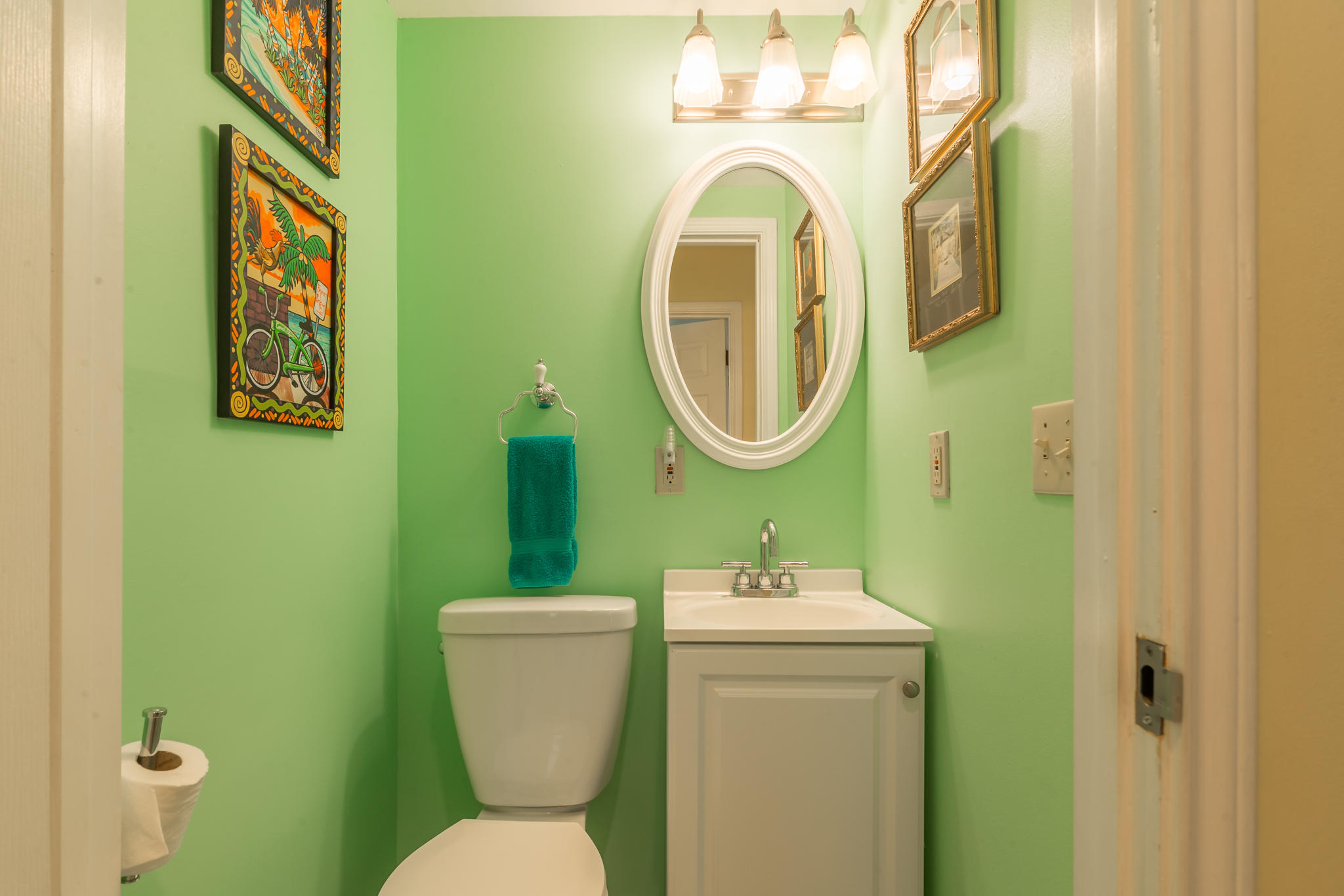102 Southard Street, Unit 2 Key West, FL 33040 - Photo 15 of 25 a bathroom with a toilet sink and mirror