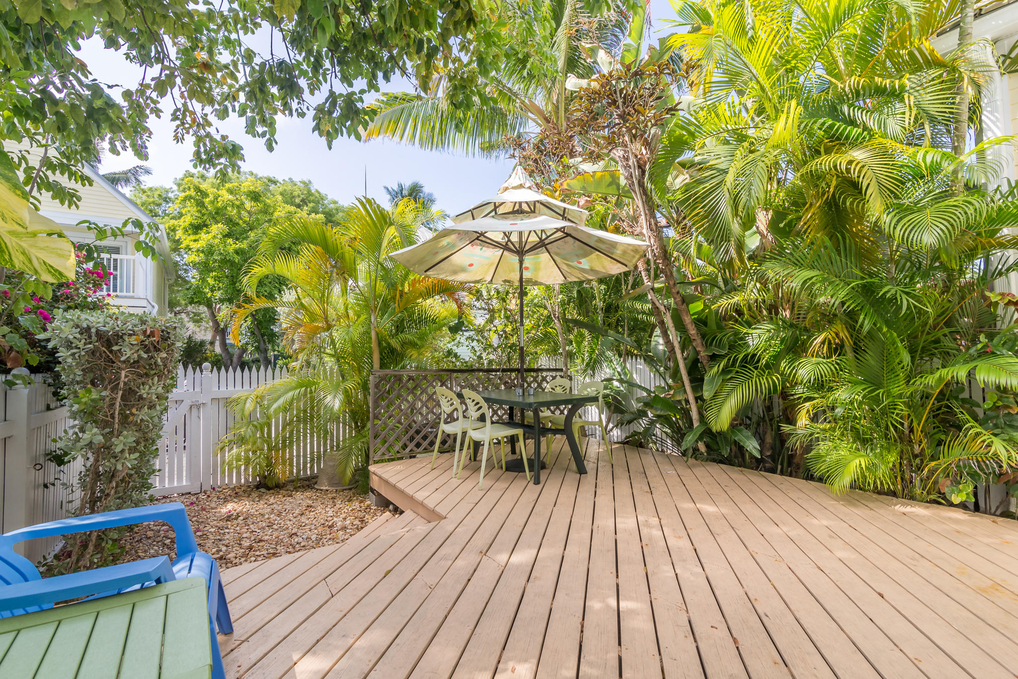 102 Southard Street, Unit 2 Key West, FL 33040 - Photo 16 of 25 a view of a chairs and table on the wooden floor