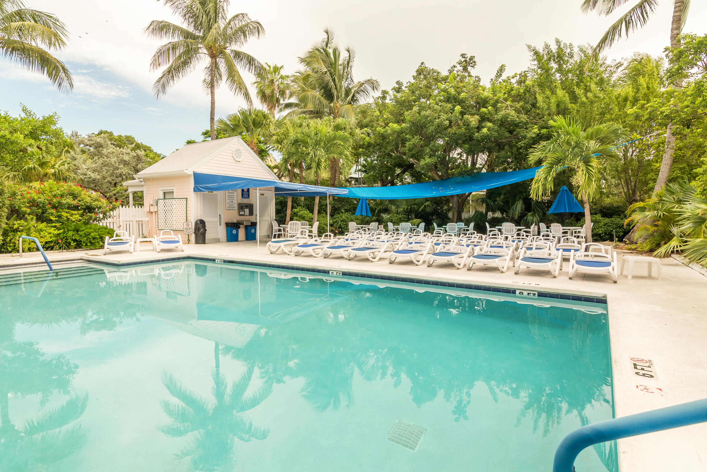 102 Southard Street, Unit 2 Key West, FL 33040 - Photo 24 of 25 a view of a house with pool and chairs