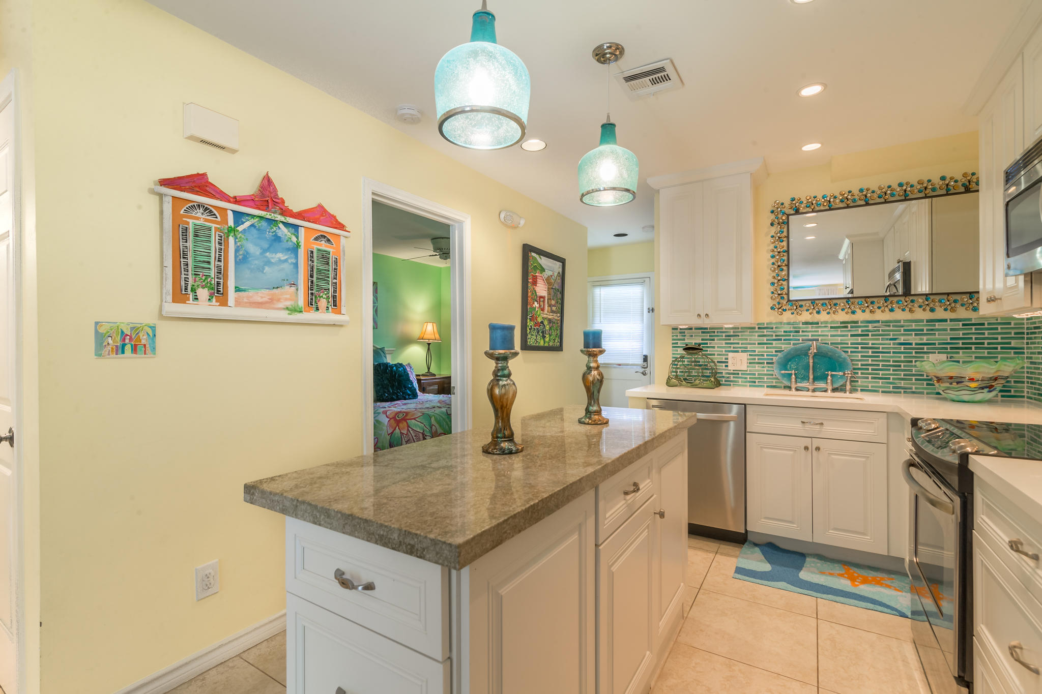 102 Southard Street, Unit 2 Key West, FL 33040 - Photo 8 of 25 a kitchen with a sink cabinets and window