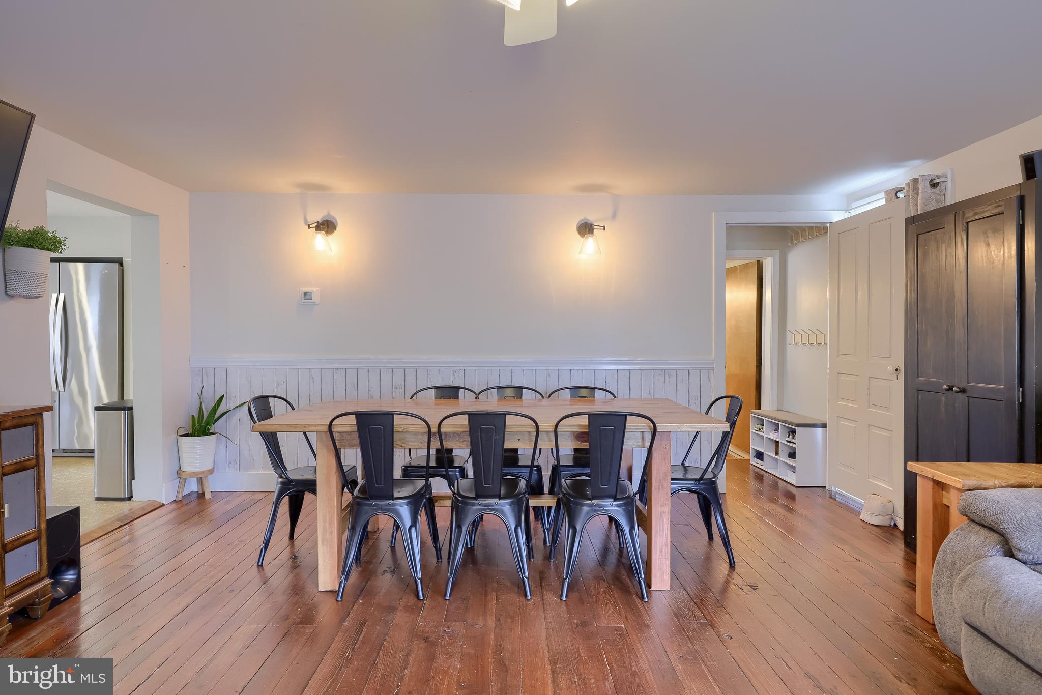 920 Chestnut Street Akron, PA 17501 - Photo 9 of 41 a view of a a dining room with furniture and wooden floor