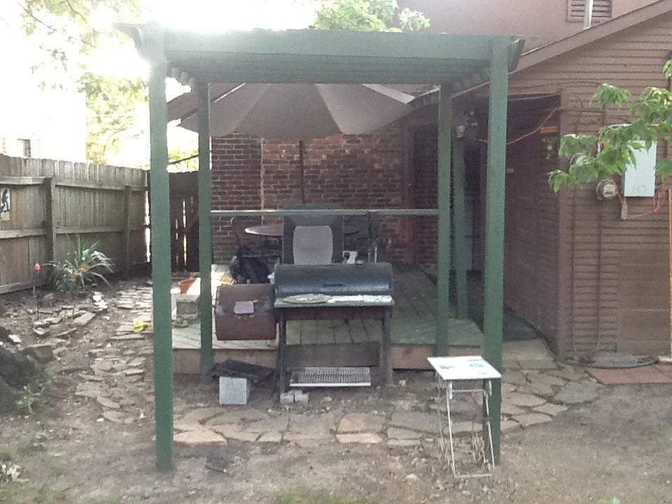145 North Rembert Street Memphis, TN 38104 - Photo 9 of 25 a view of a patio with table and chairs and potted plants