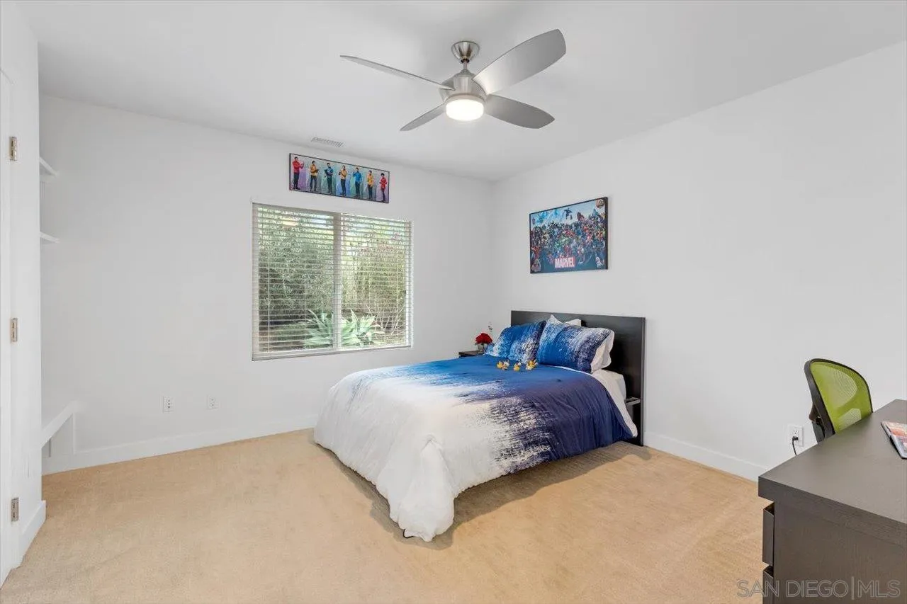 3800 Alder Avenue Carlsbad, CA 92008 - Photo 30 of 54 a bedroom with a bed and a window