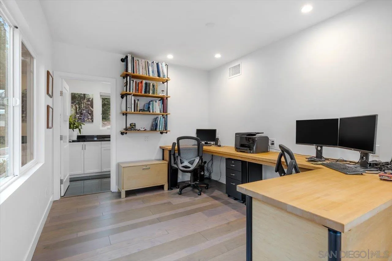 3800 Alder Avenue Carlsbad, CA 92008 - Photo 35 of 54 a room with furniture and a flat screen tv