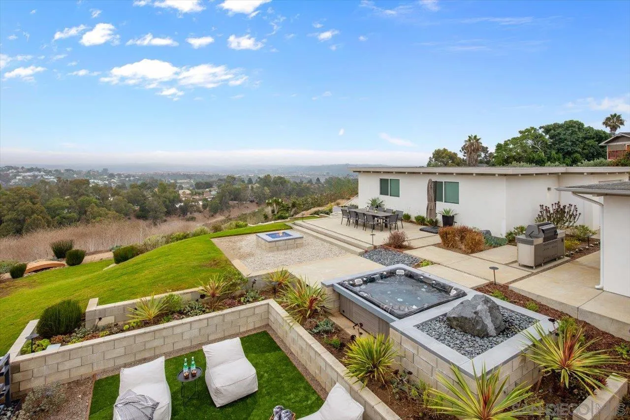 3800 Alder Avenue Carlsbad, CA 92008 - Photo 42 of 54 a view of a house with pool and chairs