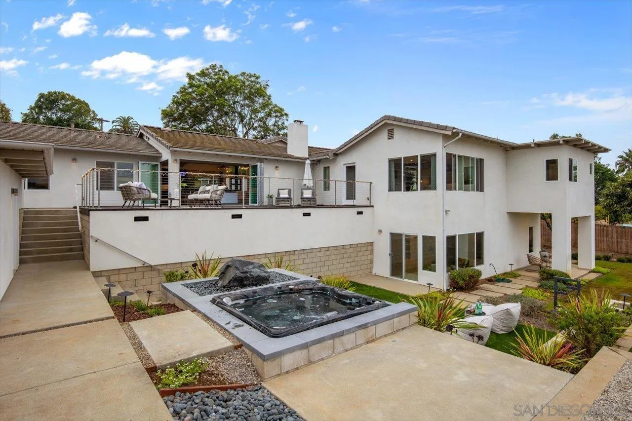 3800 Alder Avenue Carlsbad, CA 92008 - Photo 44 of 54 a house with lots of trees in the background