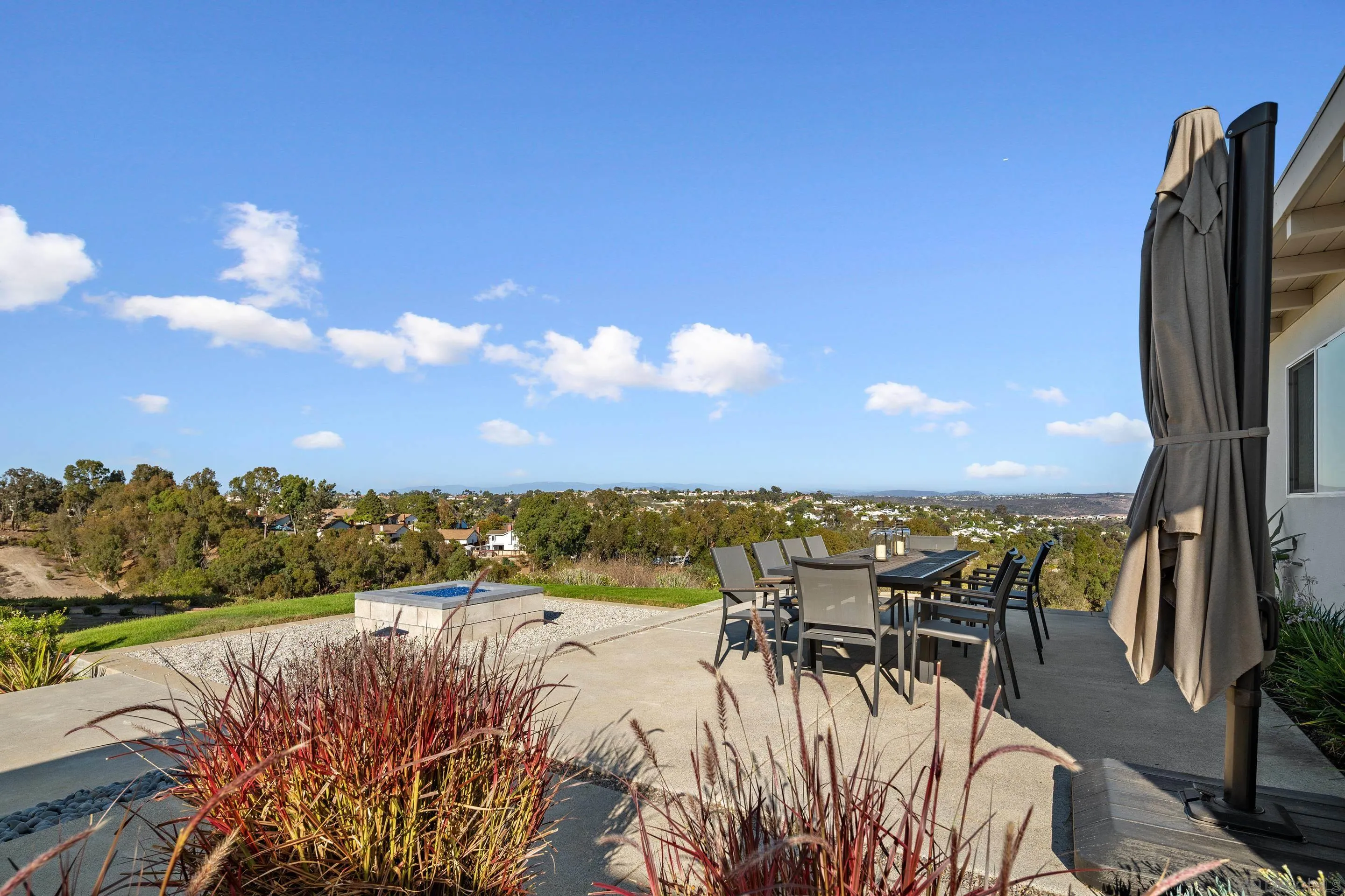 3800 Alder Avenue Carlsbad, CA 92008 - Photo 46 of 54 a view of a lake with couches in the patio
