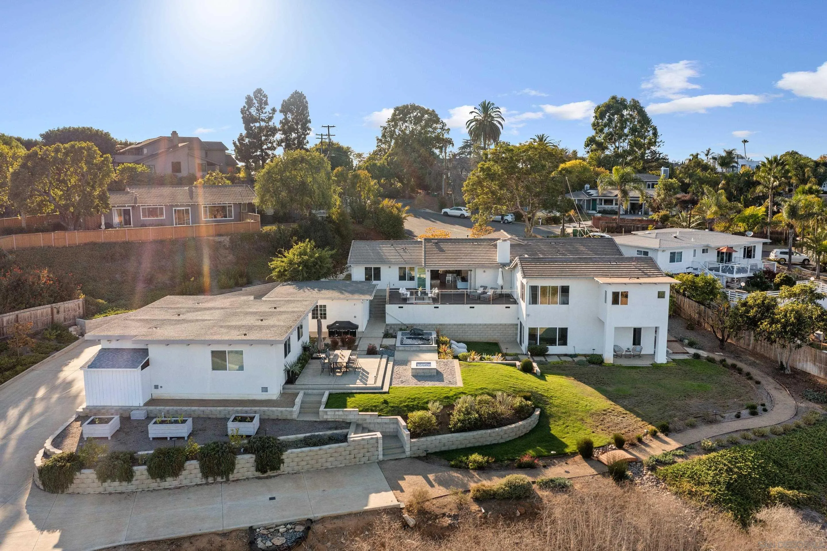 3800 Alder Avenue Carlsbad, CA 92008 - Photo 52 of 54 a view of a house with swimming pool and a yard