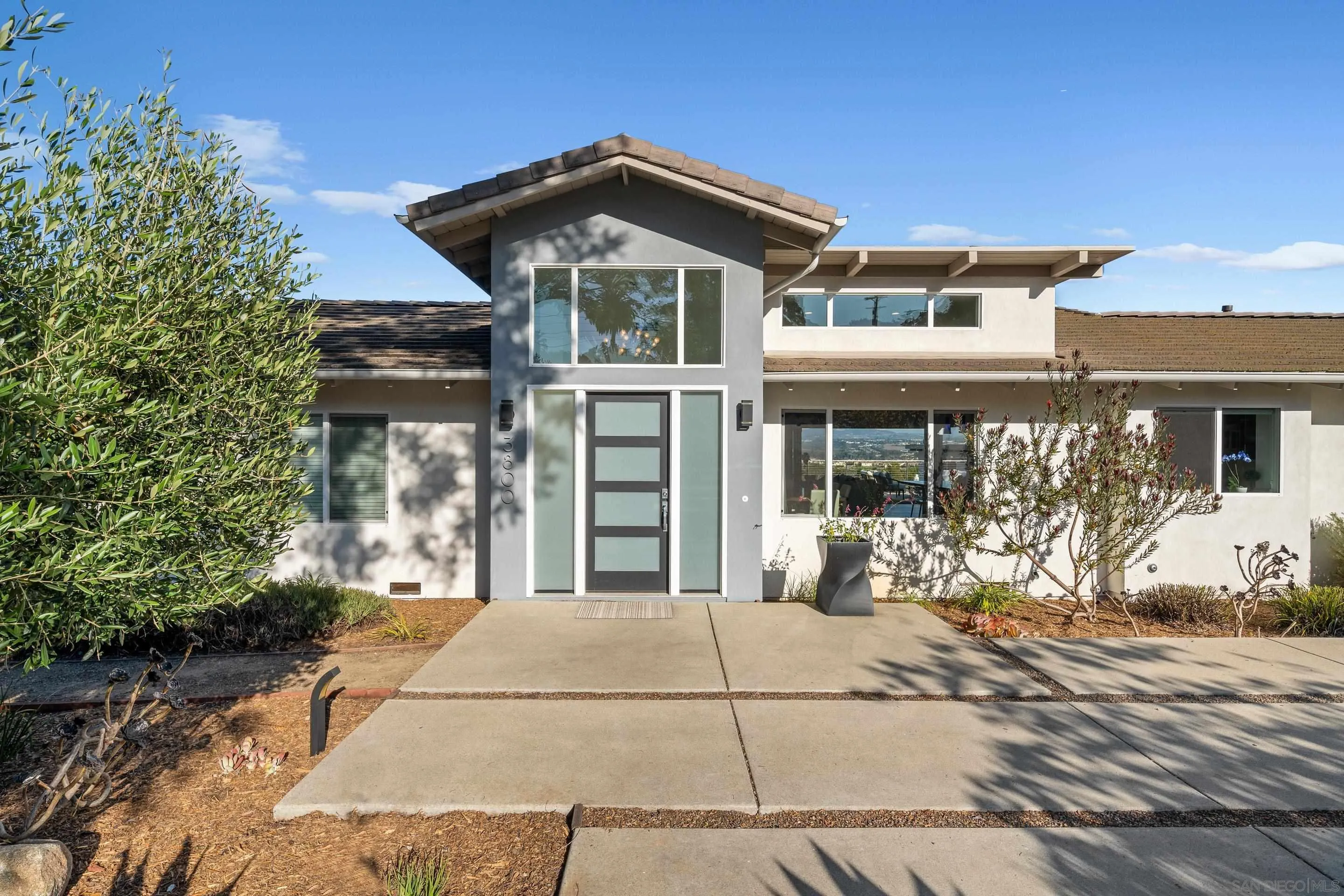 3800 Alder Avenue Carlsbad, CA 92008 - Photo 54 of 54 a front view of a house with a yard