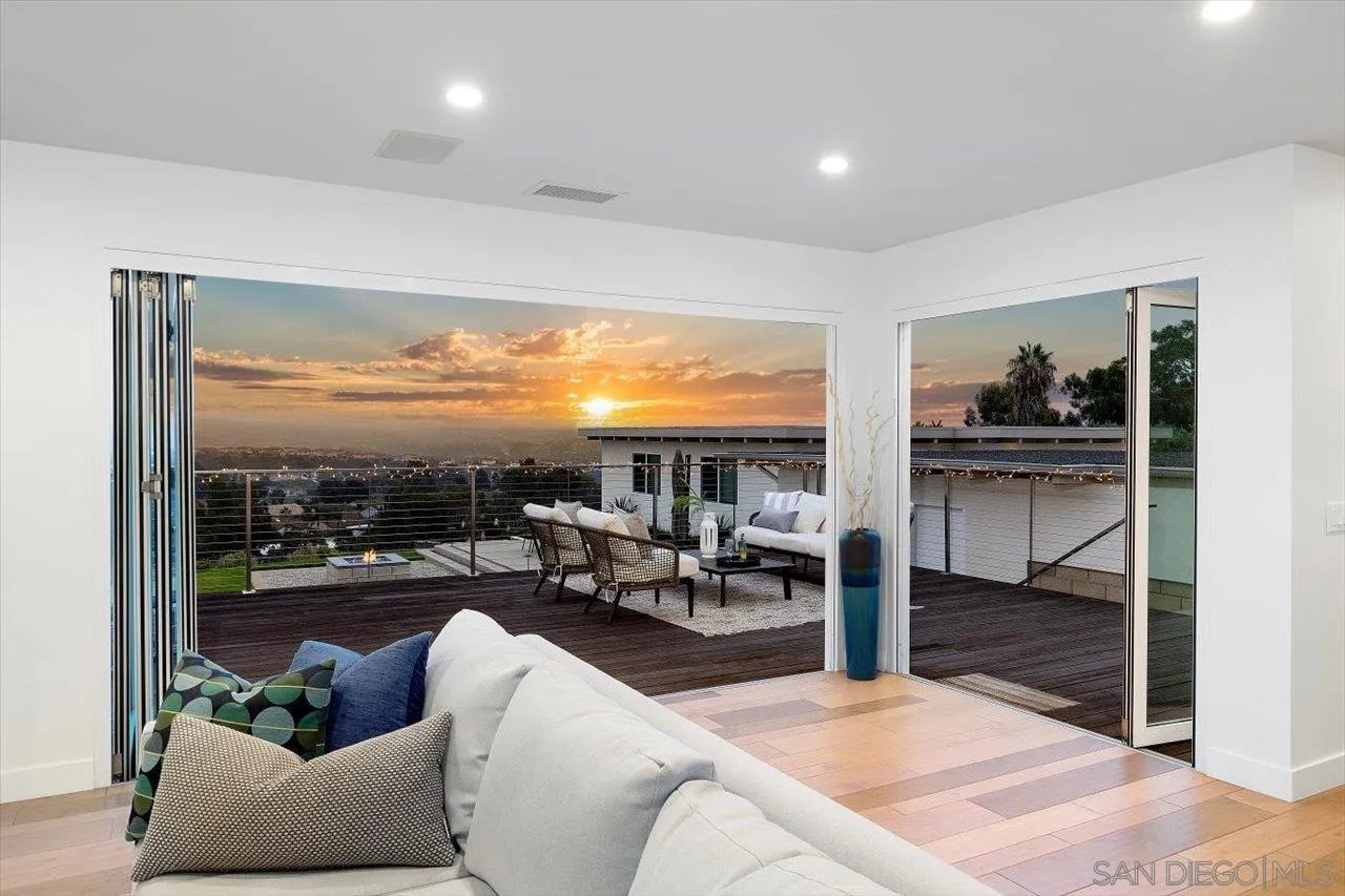 3800 Alder Avenue Carlsbad, CA 92008 - Photo 6 of 54 a living room with furniture and a large window