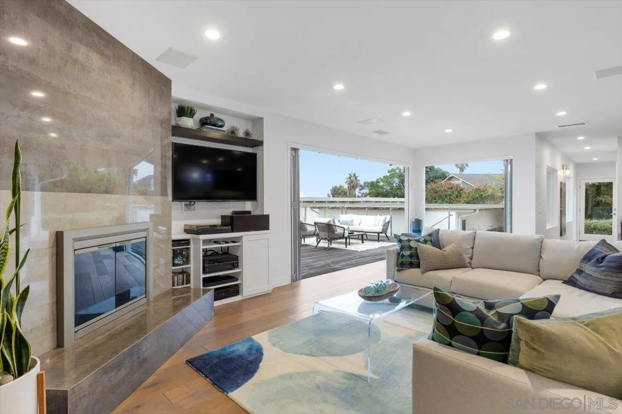 3800 Alder Avenue Carlsbad, CA 92008 - Photo 8 of 54 a living room with furniture and a flat screen tv