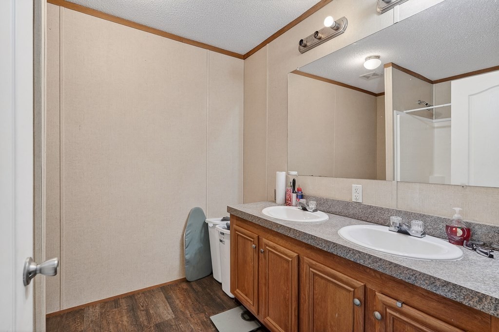 582 Doug Luna Road Walling, TN 38587 - Photo 22 of 47 a bathroom with a sink and a mirror