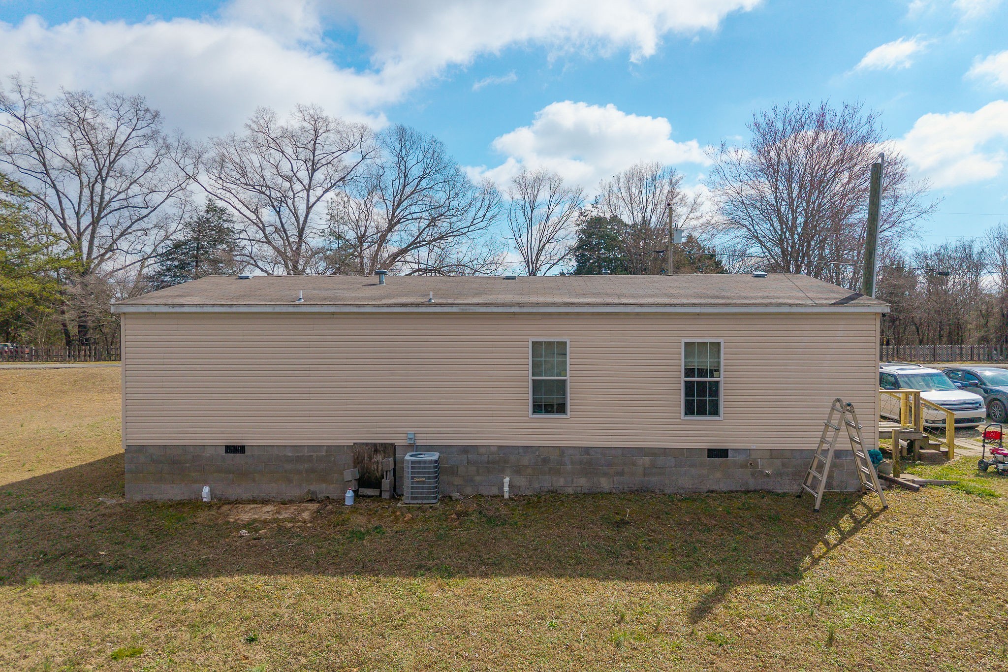 582 Doug Luna Road Walling, TN 38587 - Photo 25 of 47 a view of a house with a yard