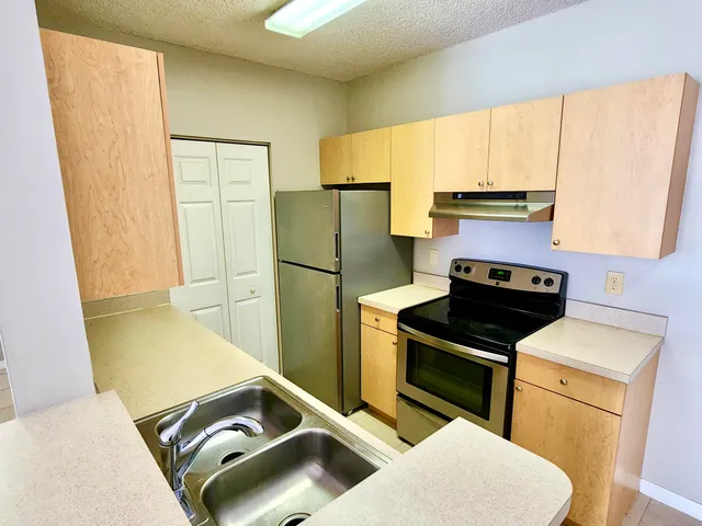 an empty room with a bathroom