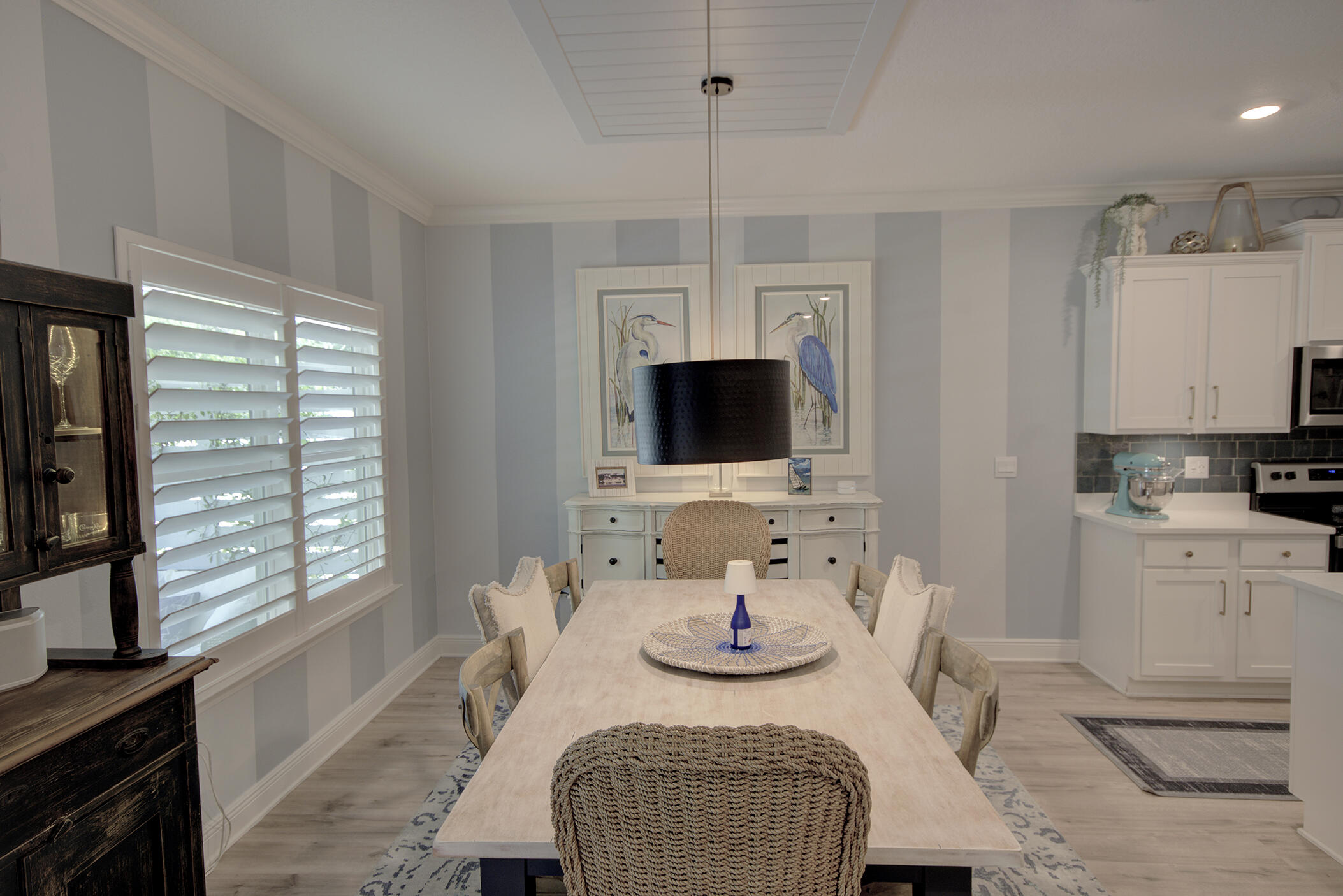 148 Piper Cove Santa Rosa Beach, FL 32459 - Photo 11 of 35 a view of a dining room with furniture window and wooden floor