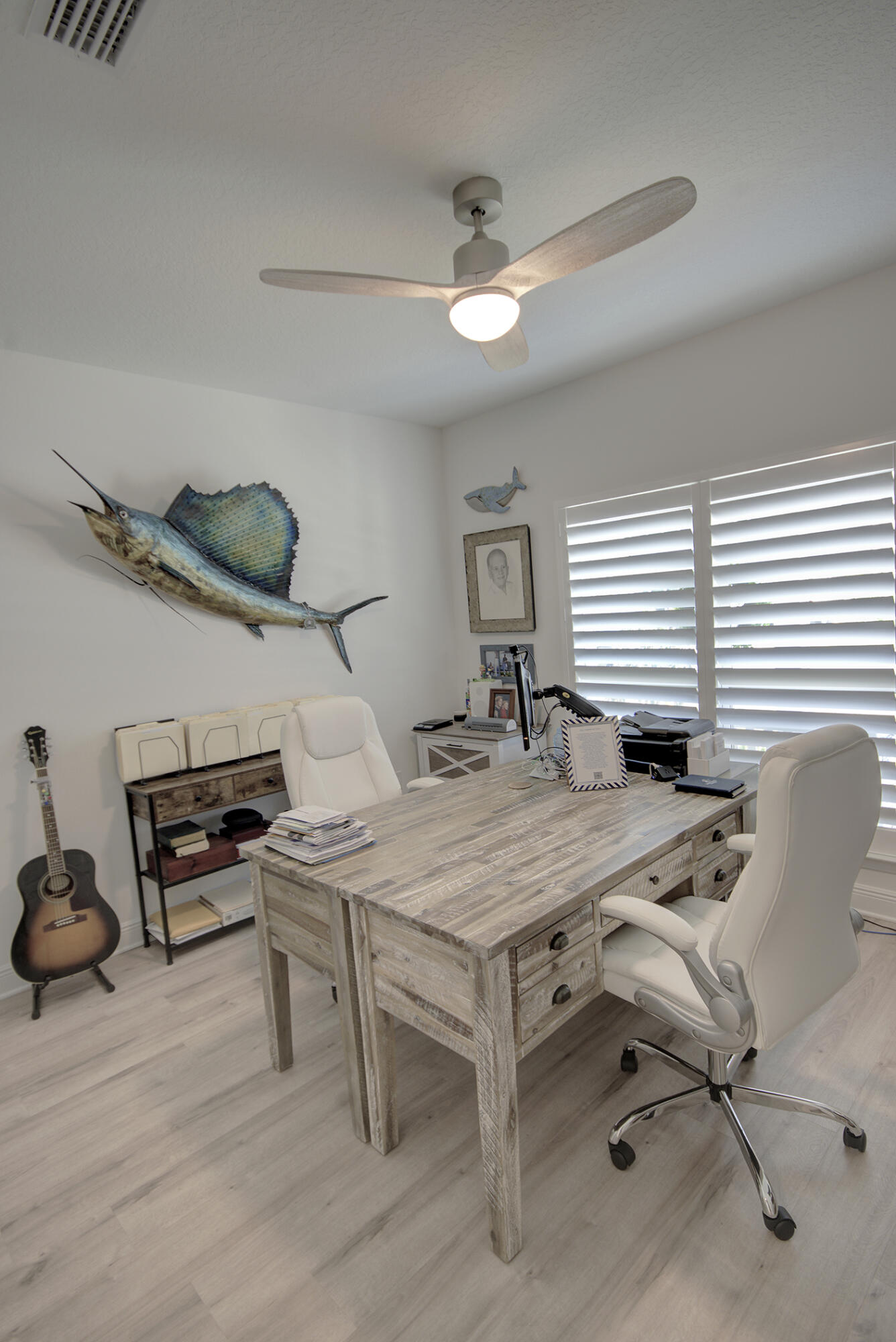 148 Piper Cove Santa Rosa Beach, FL 32459 - Photo 19 of 35 a bedroom with a bed a table and chair