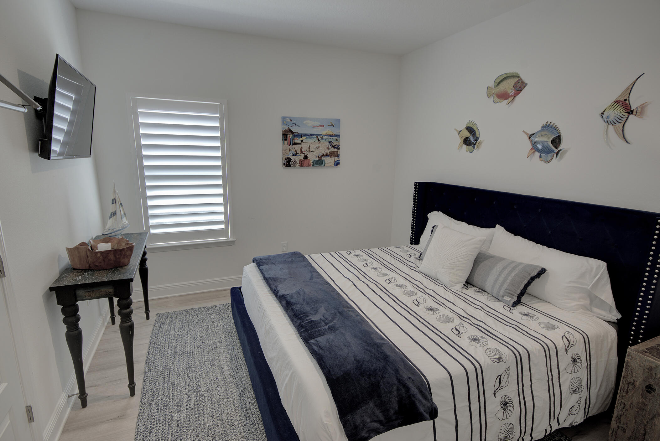 148 Piper Cove Santa Rosa Beach, FL 32459 - Photo 21 of 35 a bedroom with a bed and a window
