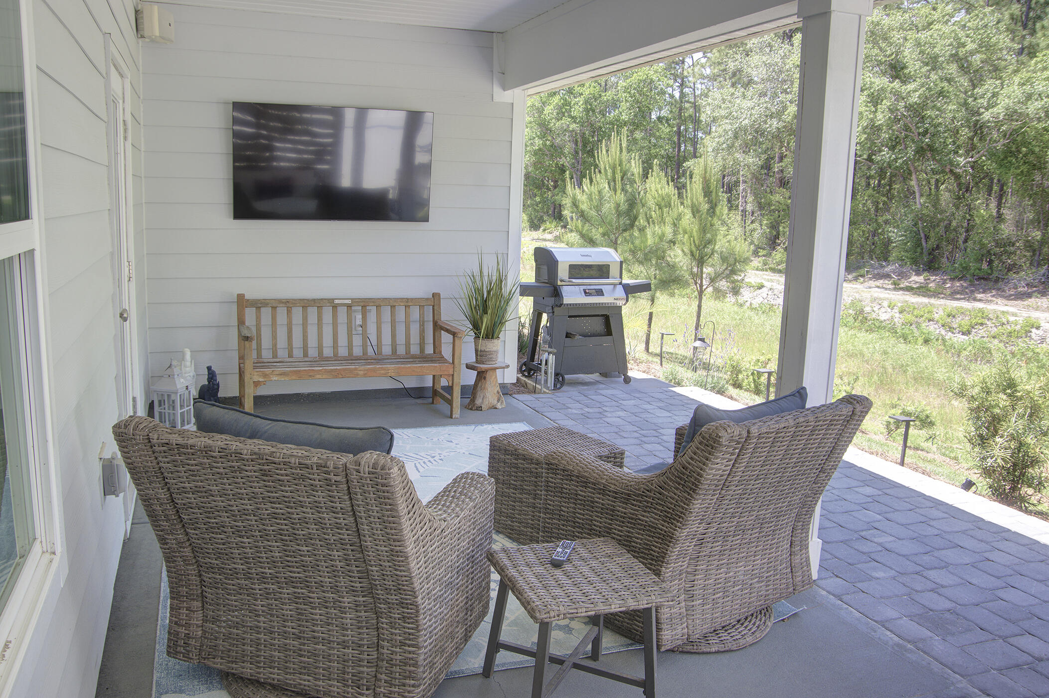 148 Piper Cove Santa Rosa Beach, FL 32459 - Photo 26 of 35 a living room with furniture and a floor to ceiling window