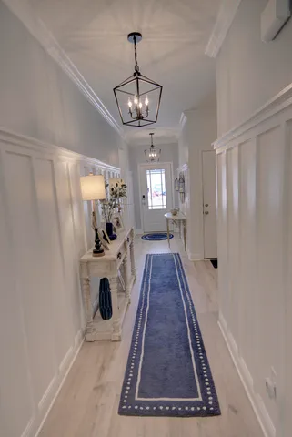 a very nice looking room with a chandelier