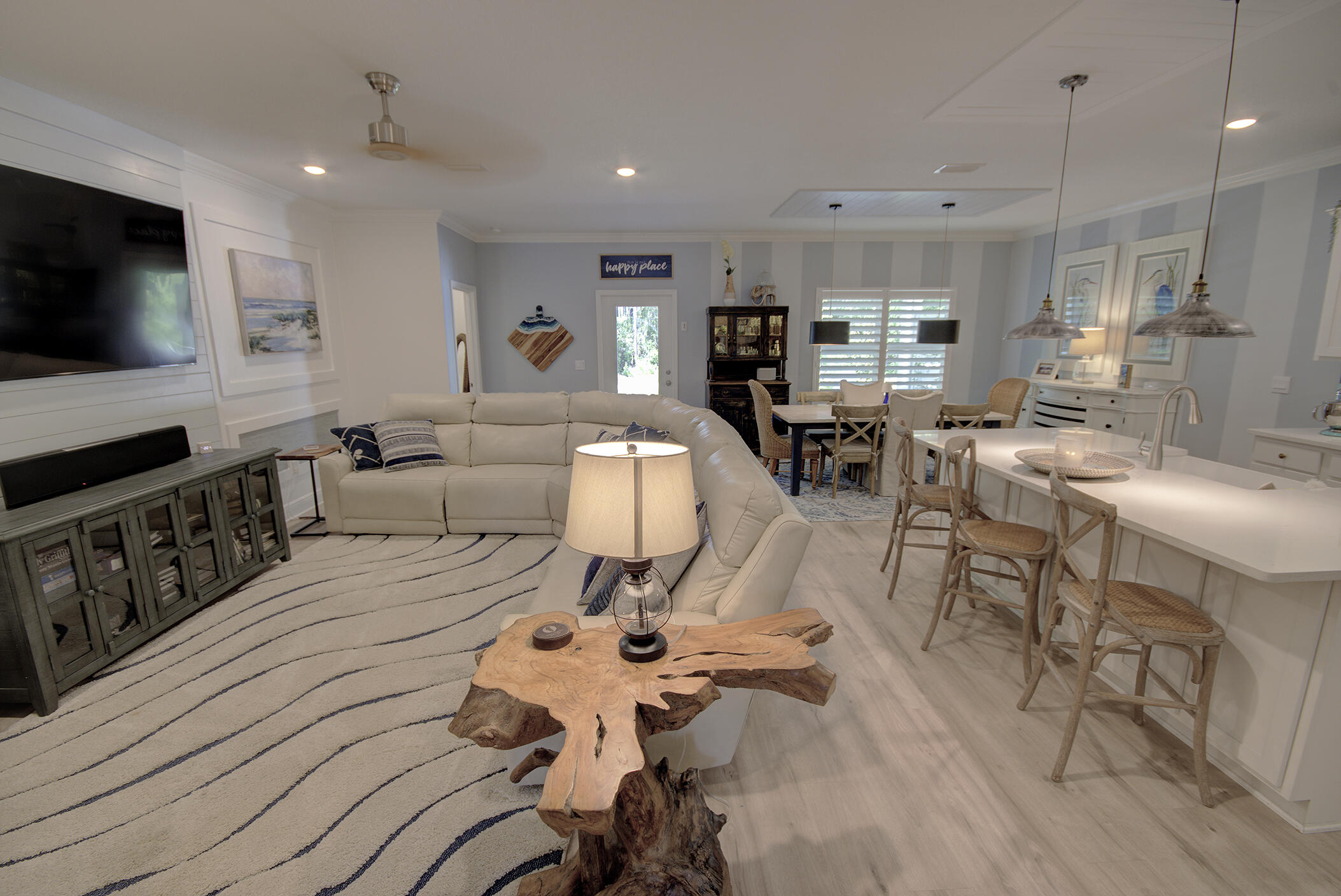 148 Piper Cove Santa Rosa Beach, FL 32459 - Photo 4 of 35 a living room with furniture and a flat screen tv