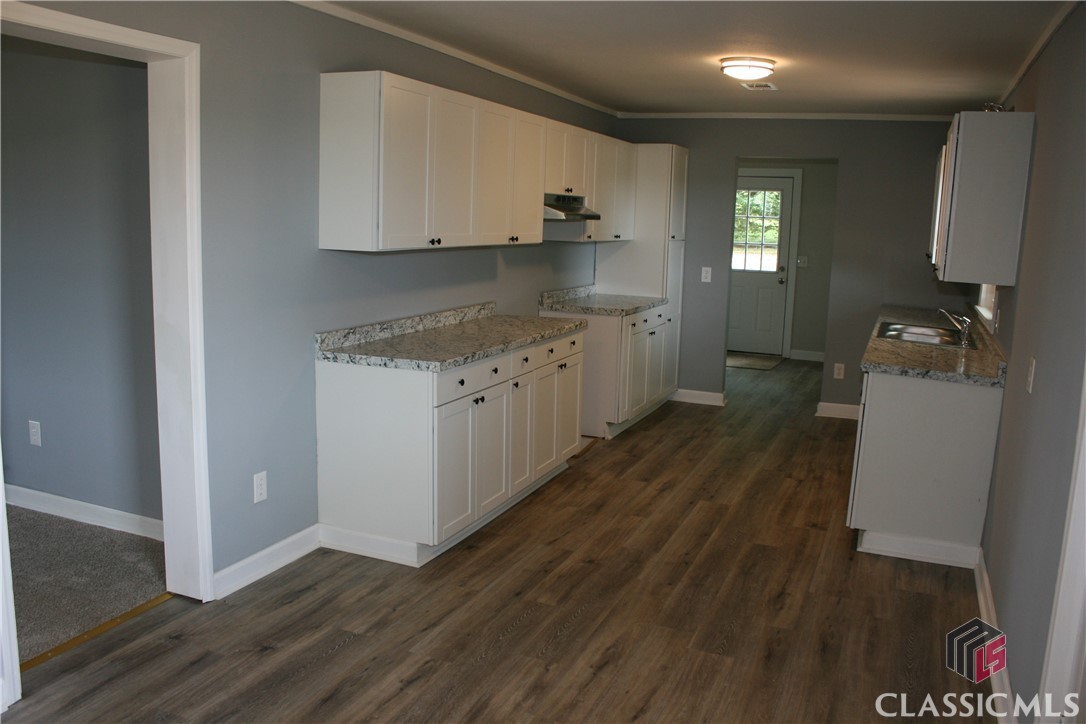 946 Joe Findley Road Royston, GA 30662 - Photo 10 of 14 Kitchen going into Laundry Room