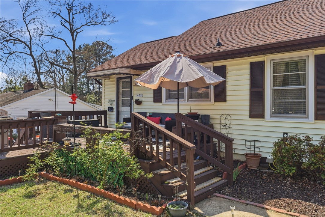 602 South Tugaloo Street Walhalla, SC 29691 - Photo 3 of 39 This charming home offers a welcoming facade with a cozy deck, perfect for outdoor enjoyment.