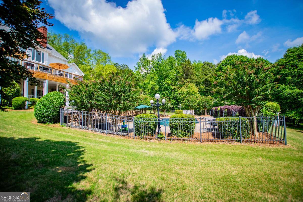 1745 Stripling Chapel Road Carrollton, GA 30116 - Photo 59 of 87 a view of house with a yard