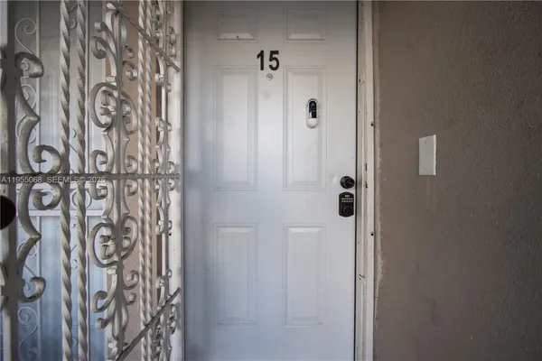 a bathroom with a shower and a window