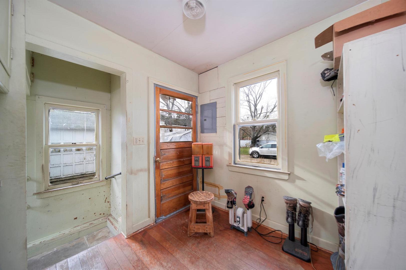 11611 Maple Avenue Hebron, IL 60034 - Photo 16 of 17 a living room with furniture and a window