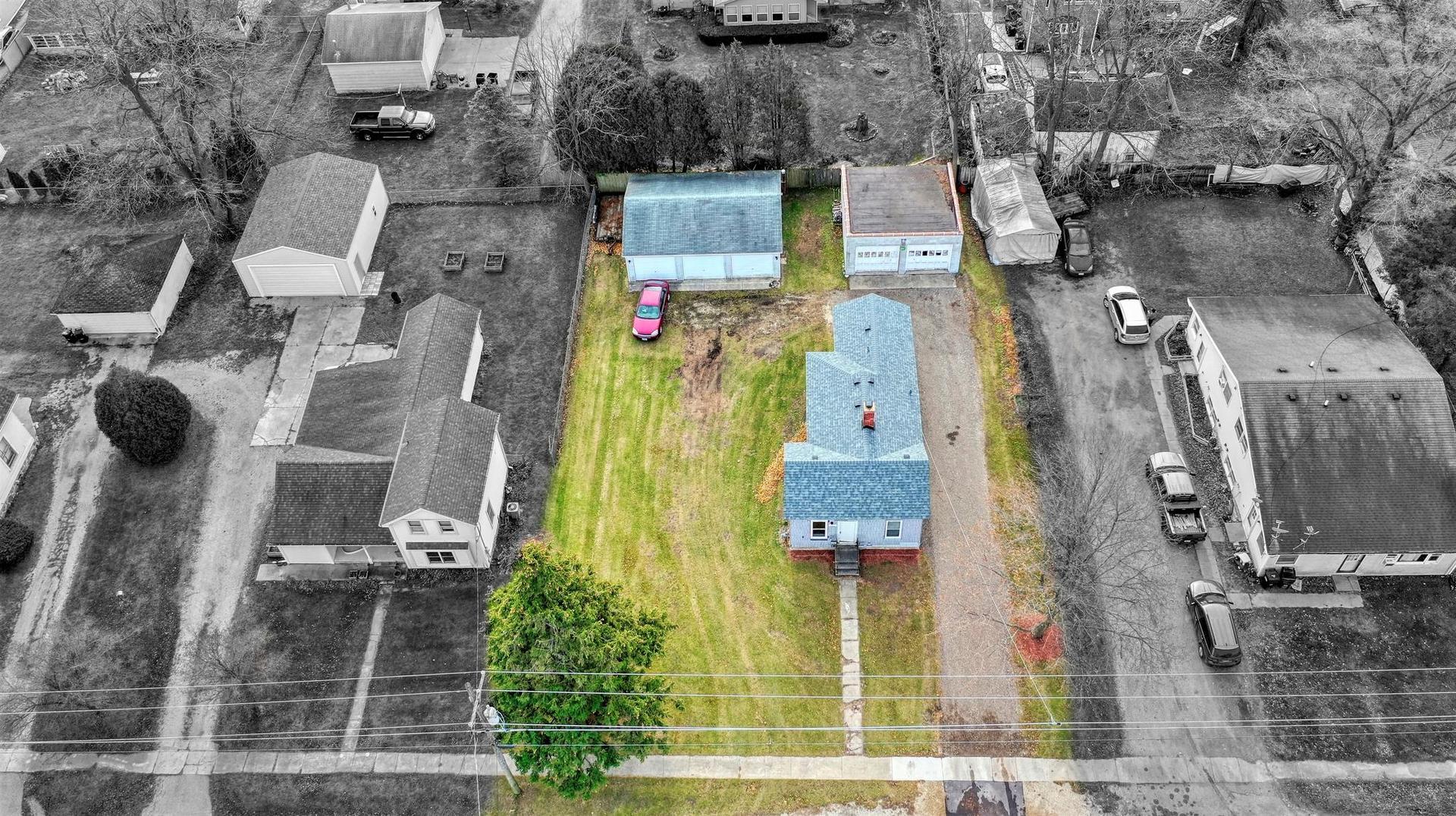 11611 Maple Avenue Hebron, IL 60034 - Photo 2 of 17 an aerial view of residential house with outdoor space