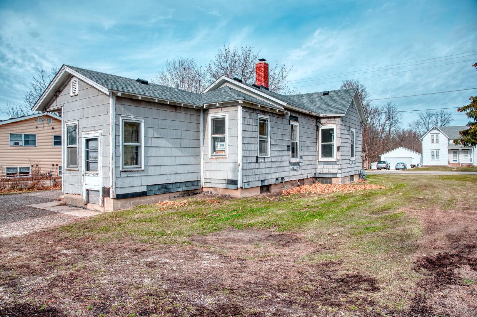 11611 Maple Avenue Hebron, IL 60034 - Photo 4 of 17 a view of a house with backyard porch and sitting area
