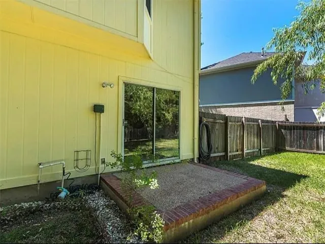 a view of a backyard with plants